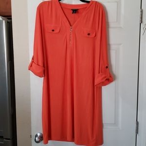 Orange stretchy dress.